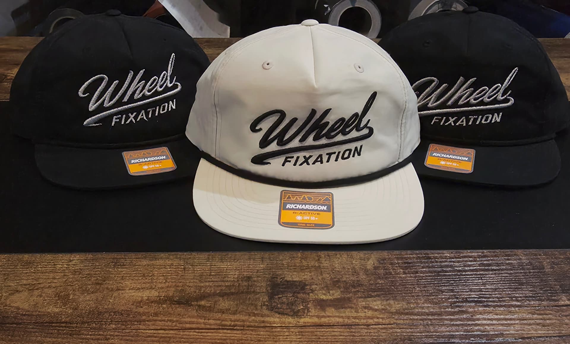 Black and cream rope hats with raised puff embroidered Wheel Fixation logo